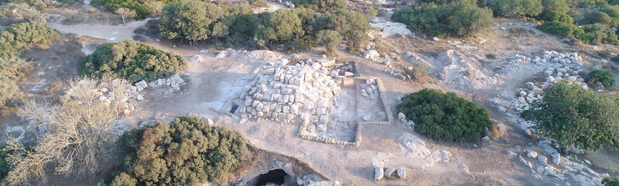 An aerial photo of area D at Horvat Midras showing the pyramidal funerary monument and the burial cave to its north (Photo: Tal Rogovski) – HORVAT MIDRAS